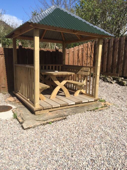 Covered picnic area in the back yard