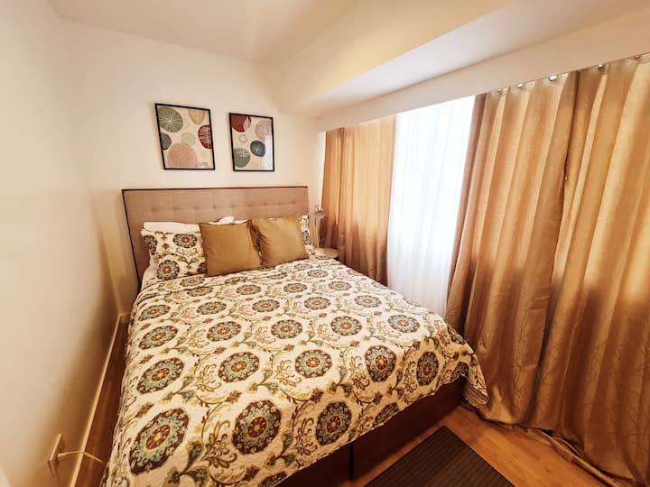 Queen sized bed in our Master's bedroom.
