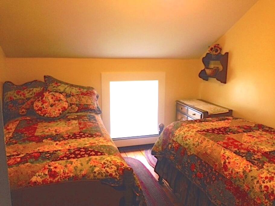 Room # 2
Has super comfortable beds with a huge window looking out to the huge maple trees in our yard.