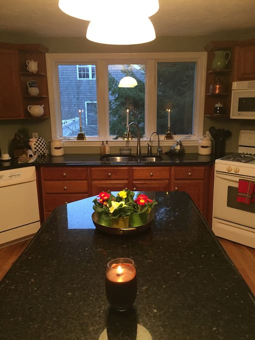 Fully equipped kitchen with breakfast nook.