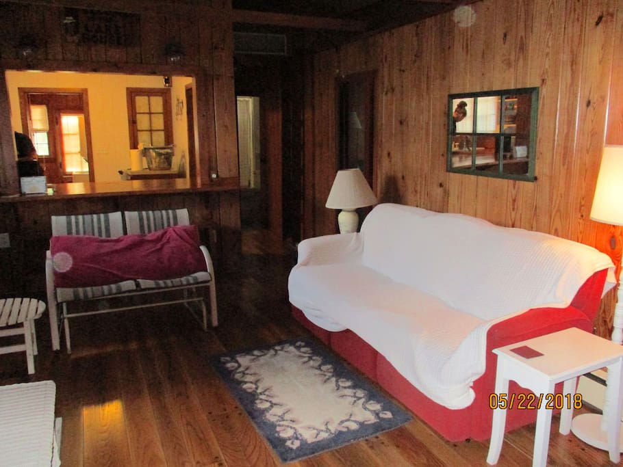 The comfortable living area has cable television and plenty of seating.