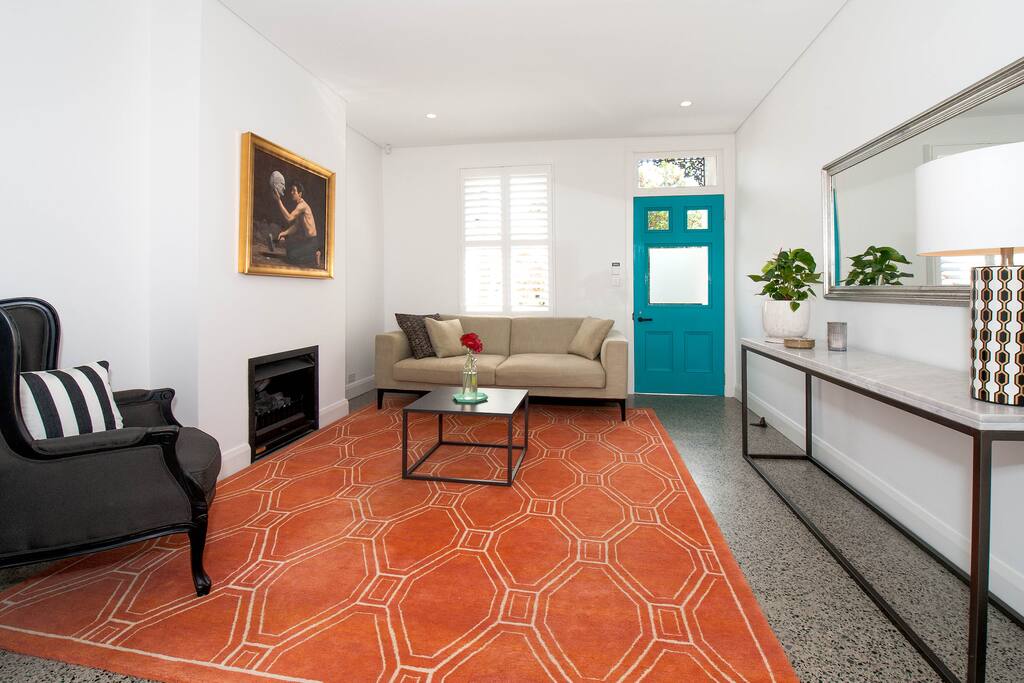 Cosy living area with open Jetmaster gas open fire.
