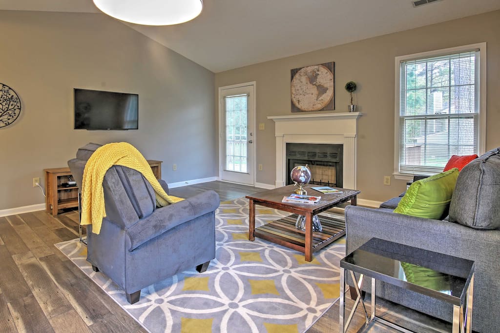 The complete updated living space features modern decor, new furniture, fixtures and kitchen appliances.