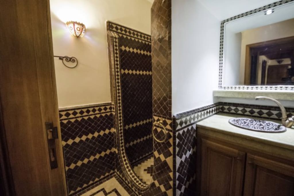 Beautiful bathroom all floors and walls hand made mosaic local tiles and marble matching the room colors of Atlas mountain.