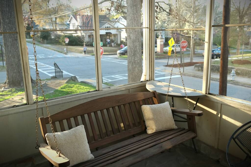 The screened-in porch is an amazing place to relax and get some fresh air.