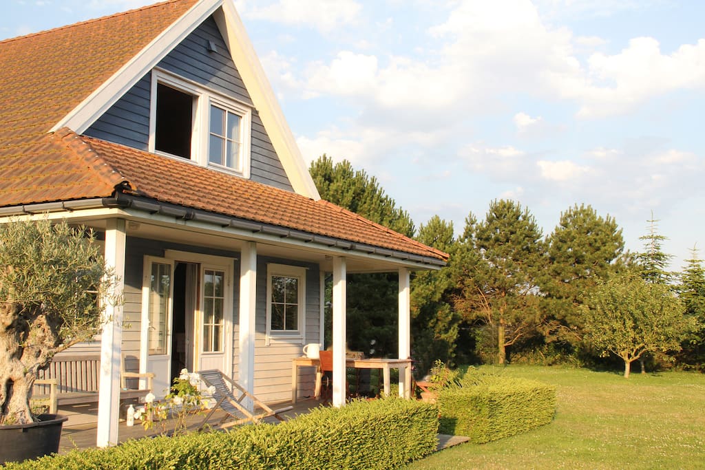 Yhe house with is terrasse with sun during all the day, la maison avec sa terrasse ensoleillée toute la journée.