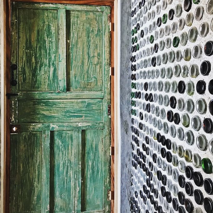 Repurposed antique doors on the bathroom.