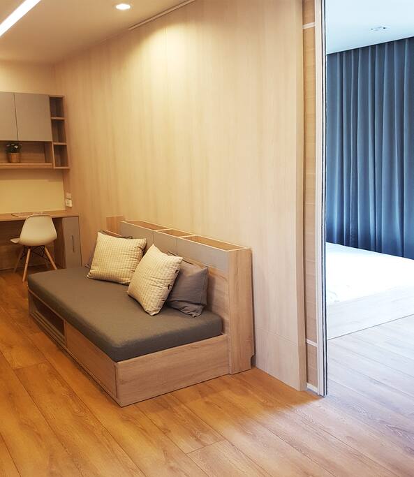 Sliding door between living area & bedroom