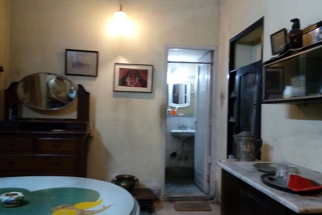 The private room has an attached, compact bathroom with WC.