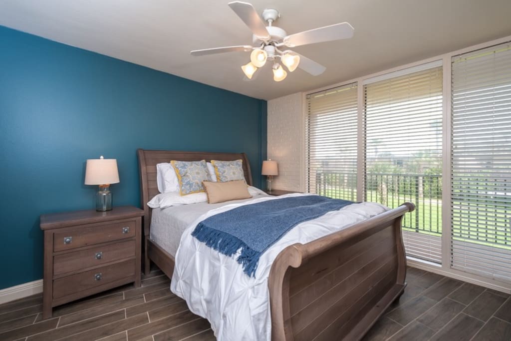 The master bedroom with a queen bed.