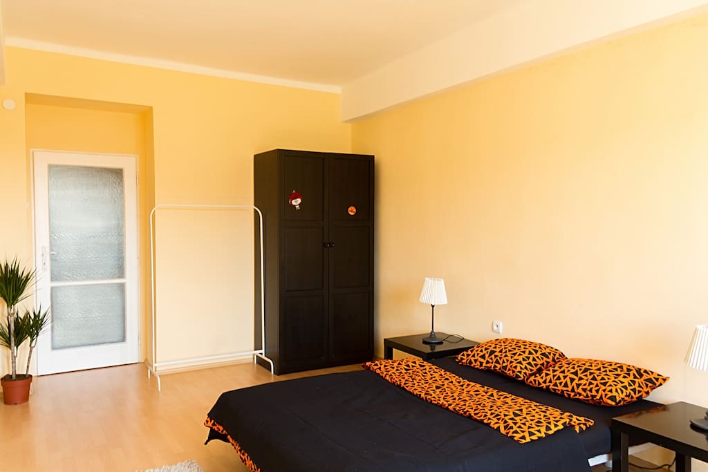 This bedroom has all you need for your comfortable stay in Prague:
Comfy bed with soft pillows, wardrobe, work-table and comfy armchair