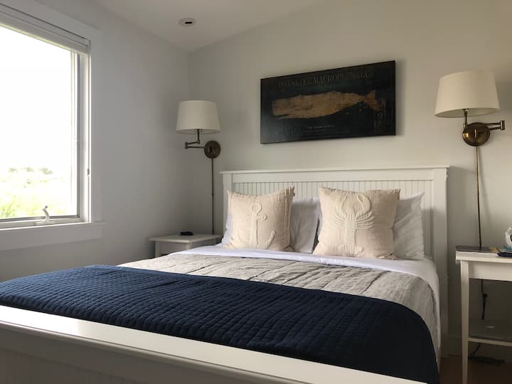 Bedroom 1 - Comfy queen bed fitted with fine linens