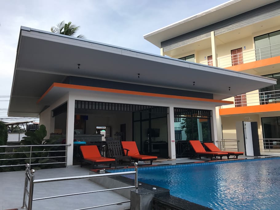 This is reception with pool and solar bed, shower