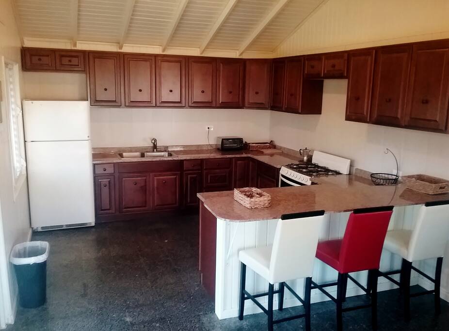 Shared Large Kitchen -
6 burner gas stove,
breakfast bar.