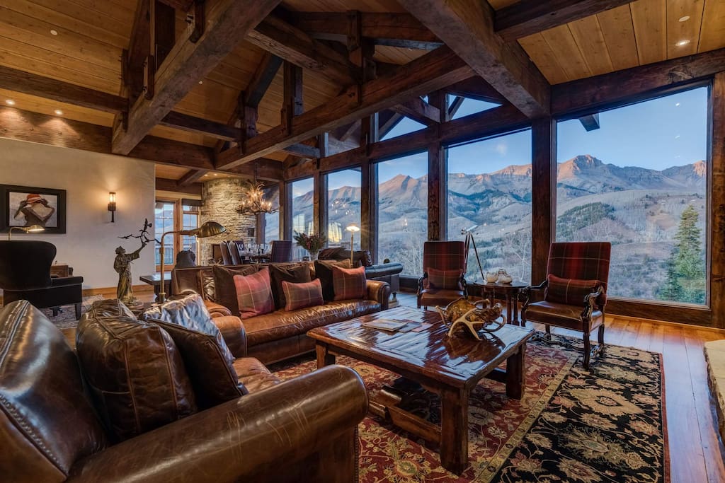 The exposed beams above the living area provide a rustic touch to an exquisite design.