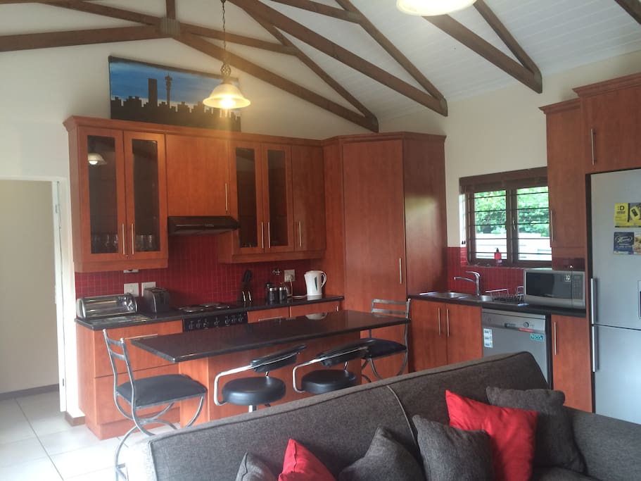 Well equipped kitchen cum sitting area with TV