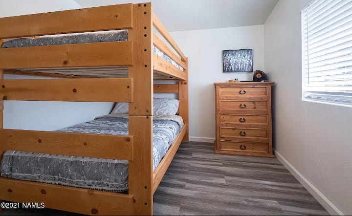 Guest Bedroom with full size bunk beds to comfortably sleep 4 children or 2 adults.