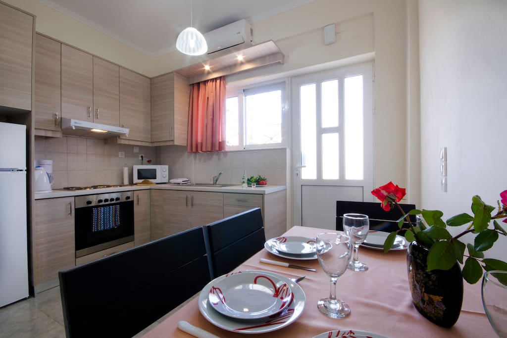 Dining area and fully equipped kitchen