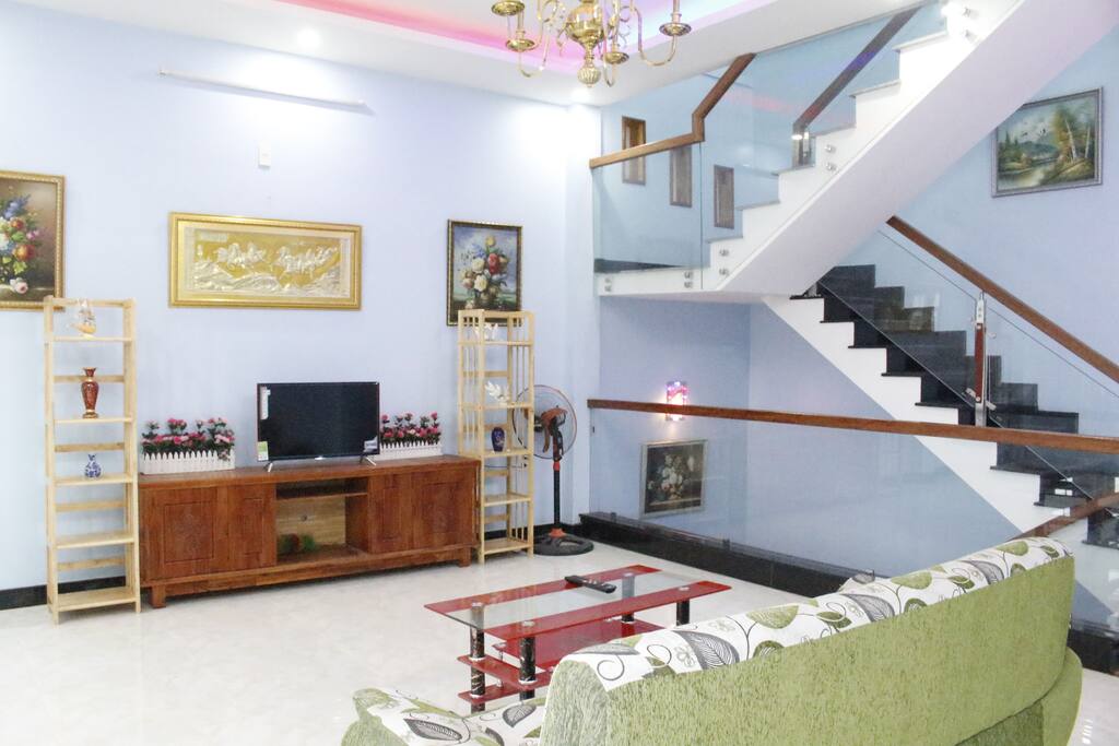 3rd Floor: Morden Living room#3 with TV, a set sofa and bookshelf + 1 Bedroom + 1 Bathroom + 1 Balcony