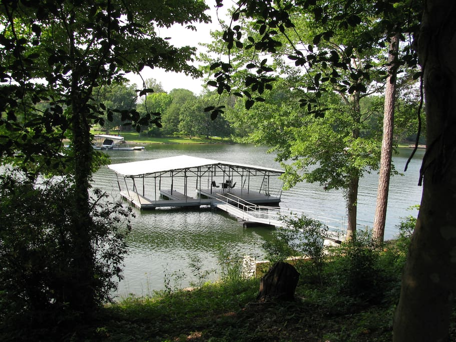 covered dock with deck and swim ladder