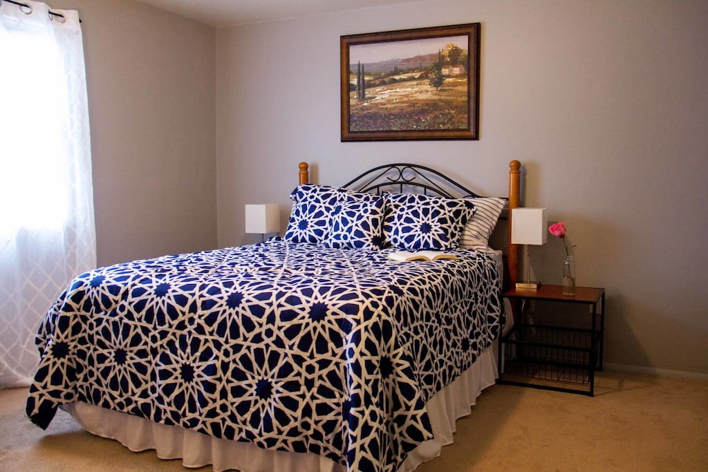 Blue bedroom. Pillow top premium mattress, large closet, and a dresser for clothes.