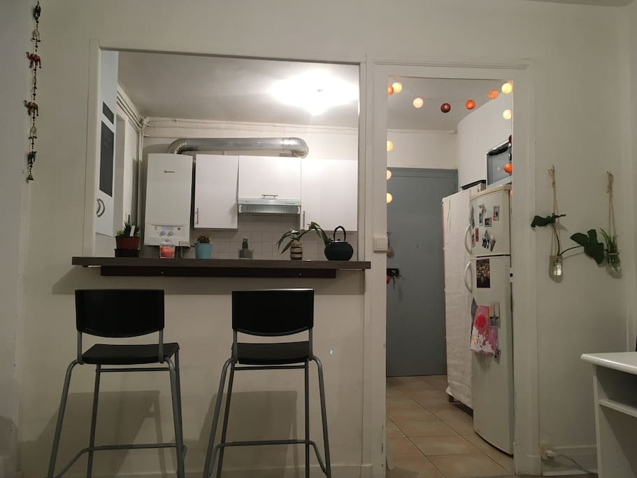 Coin bar donnant sur cuisine
