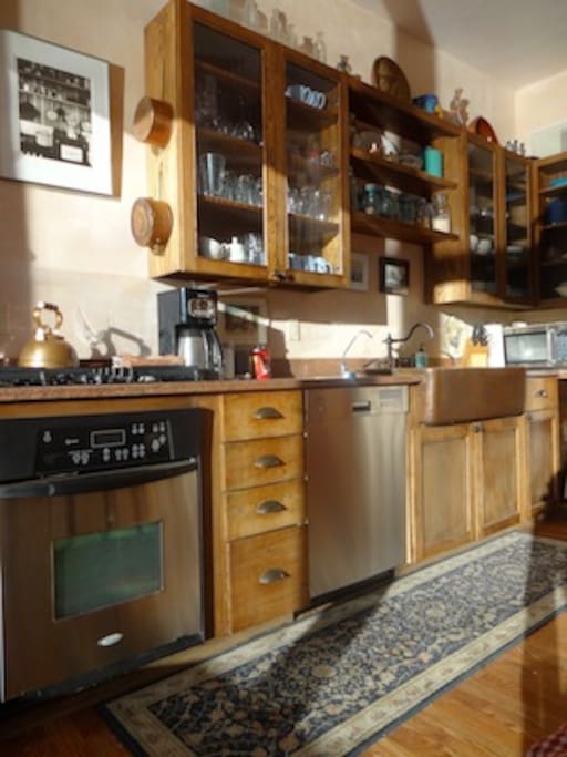 Fully Equipped Kitchen. Modern appliances and copper farm sink