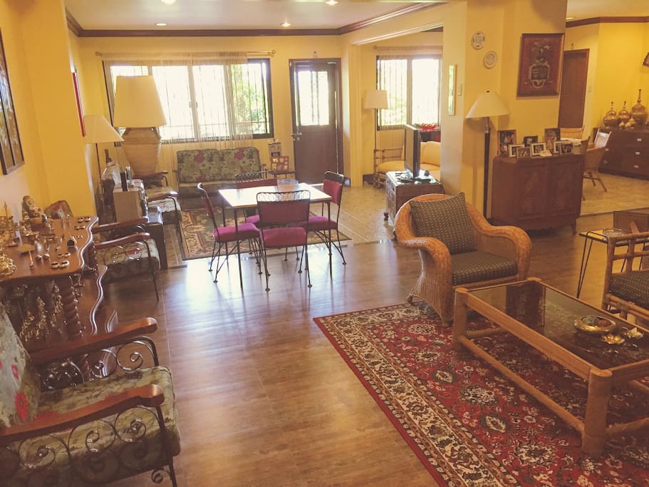 View from door, entire first floor with living room & dining room area with downstairs bathroom.