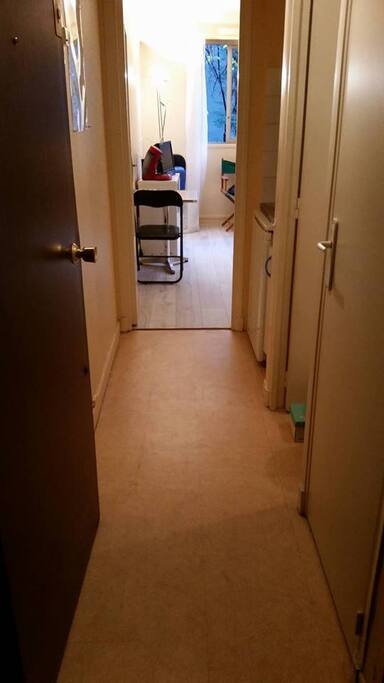 hall between living room, kitchinette and bathroom (with WC)