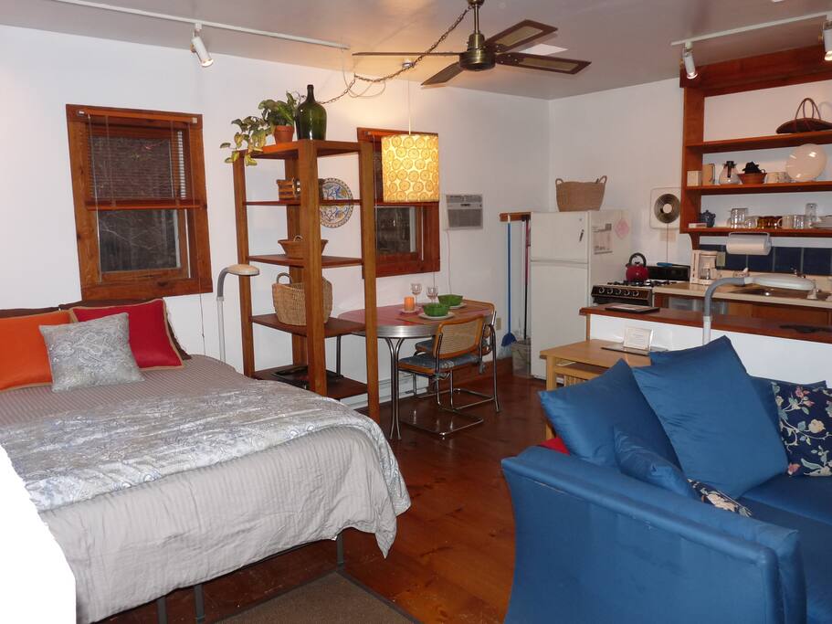 Four distinct "rooms" divided in compartments of sleeping, lounging, cooking and dining