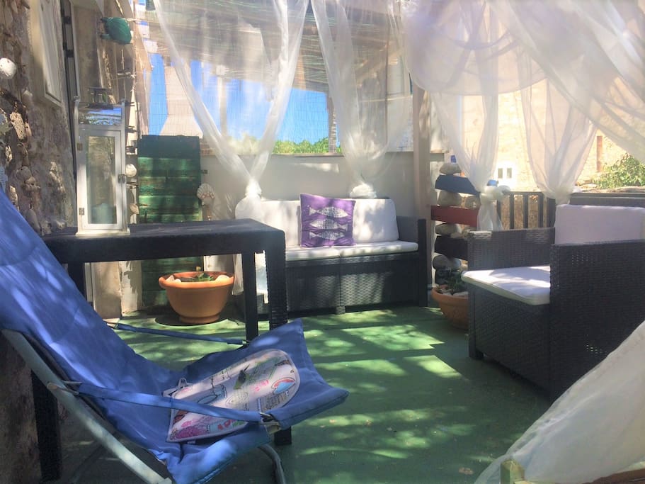 A chilled out space on the back terrace for drinks or dinner or just lounging!