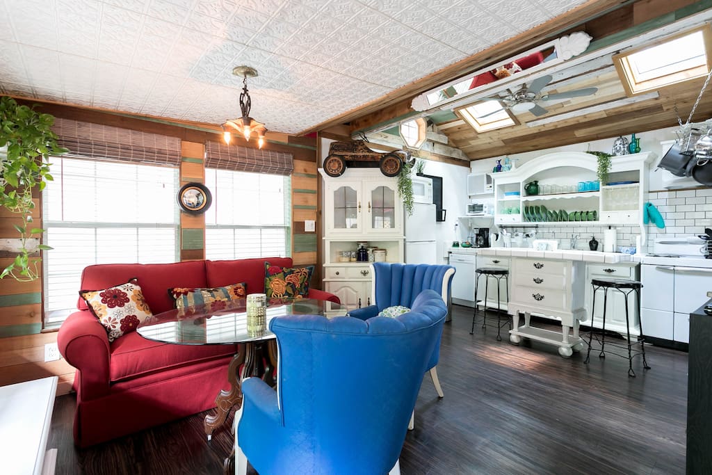 Living Area with kitchen and sky lights in background