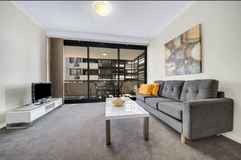 Central 2 bed, 2 bath modern apartment with patio