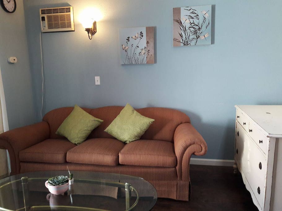 COUCH AND CAN BE USED AS AN EXTRA BED