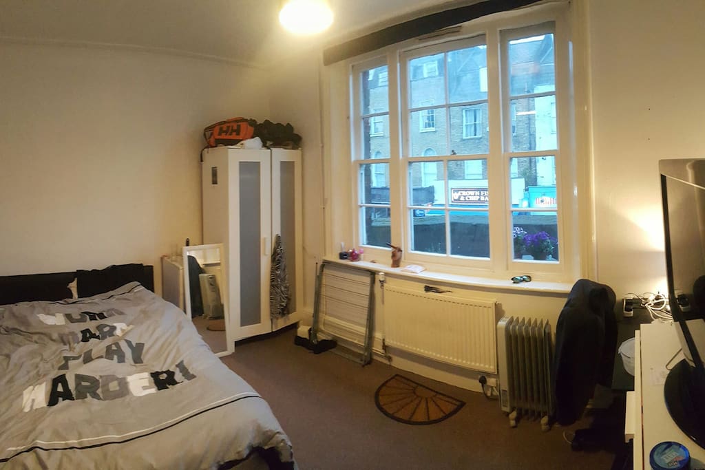 Large bedroom with balcony access