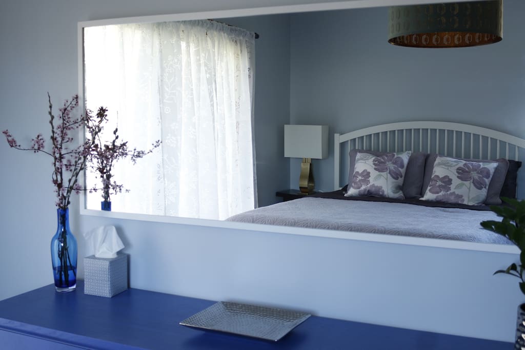 Bedroom with natural light, queen sized bed and dresser to put your clothes.