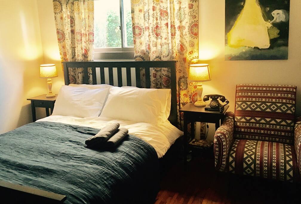 Nice room with a comfy bed and a walk in closet