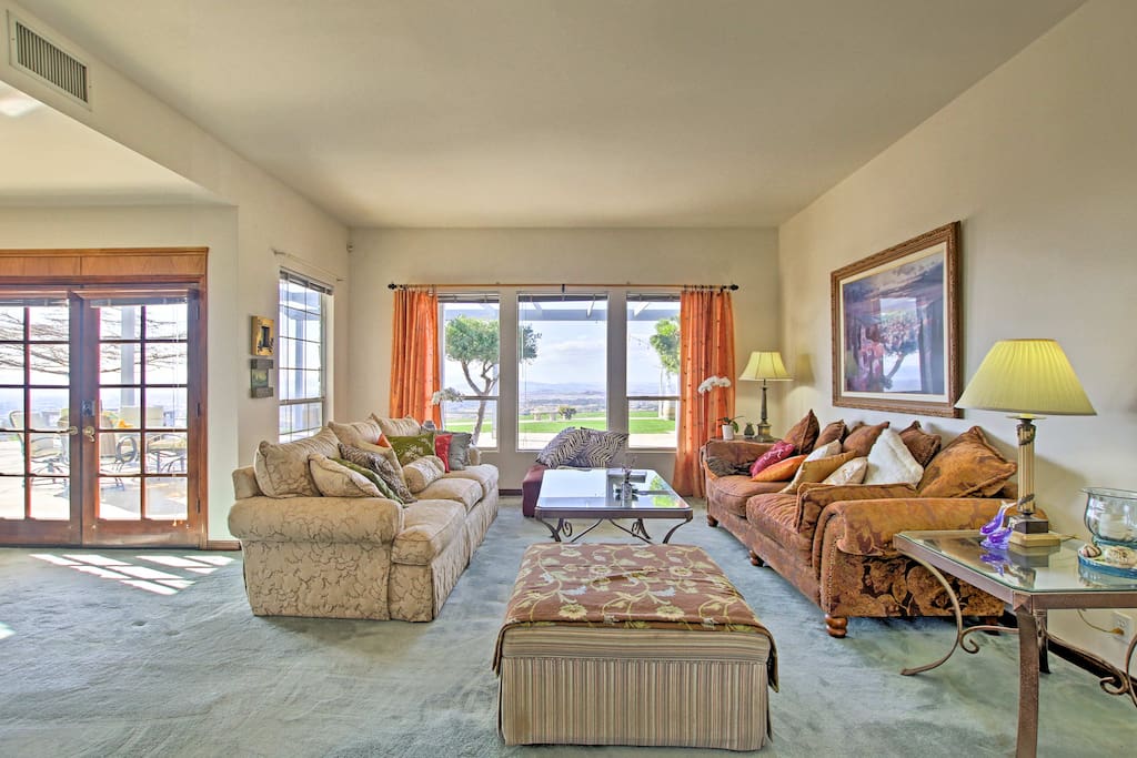 The mother-in-law suite sleeps 4 guests in an elegant living space.