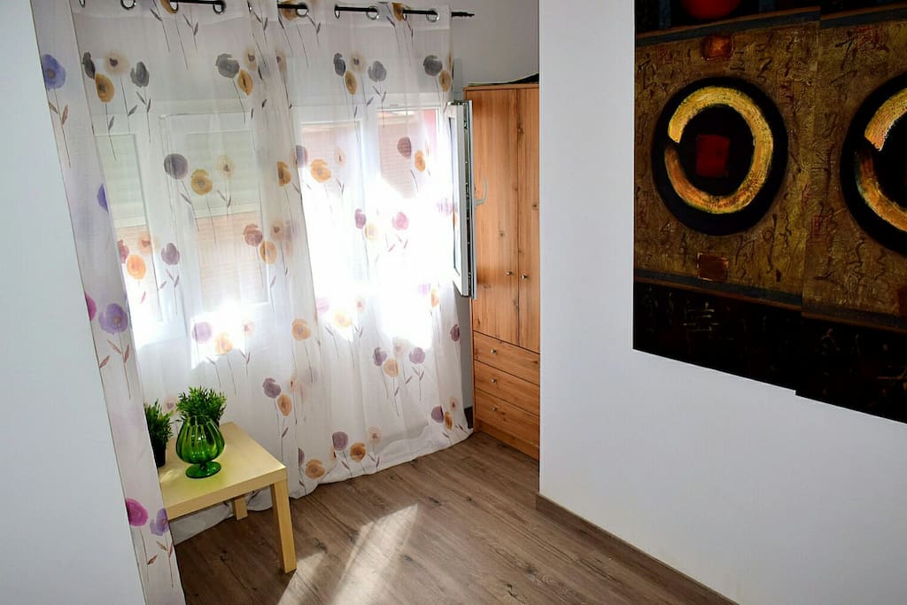 Double bedroom, perfect for 2 persons. The rest of the house is shared with other guests: kitchen - possibility for cooking, living and dining room, 2 bathrooms.