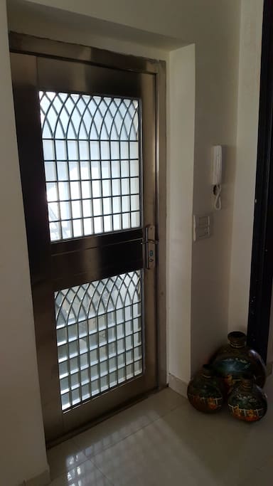 Front Door with Security System at Entrance