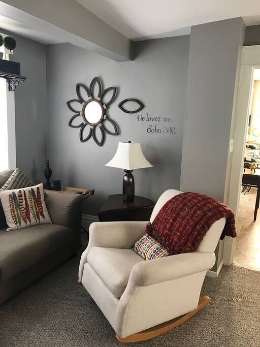 First floor living room with large 46 inch flat screen tv.
