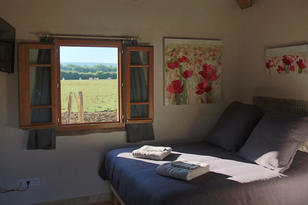 La chambre avec vue sur le champ de vaches