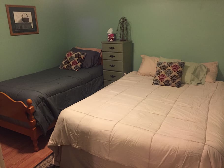 Room with One Twin and One Queen Air Mattress