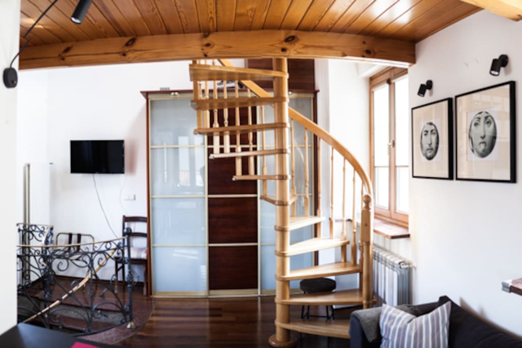 Living space and stairs to the sleeping area.