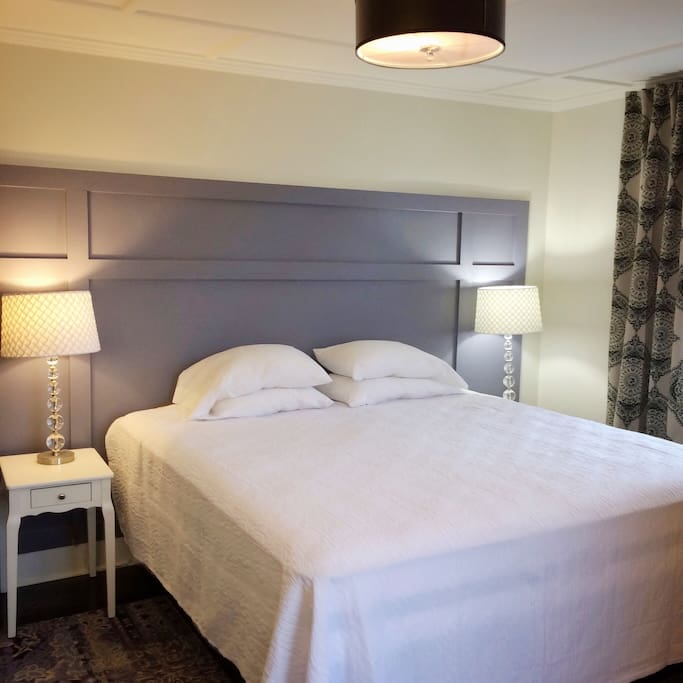 Room #5 features a king sized bed.