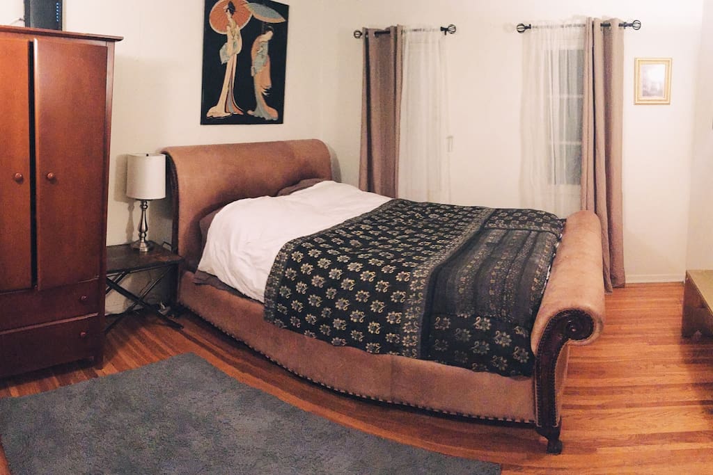 Super Cozy! Beautiful leather sleigh bed, with amazingly comfortable Queen pillow top mattress, excellent wifi connection with ethernet hookup available - large armoire comes equipped with hangers, iron, and ironing board.