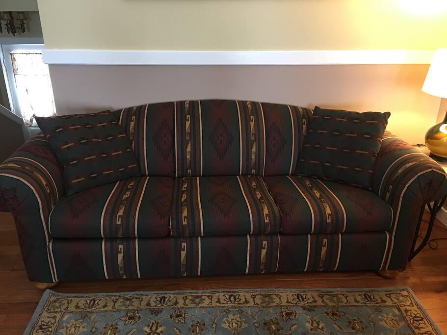Sofa bed located in the living room. Memory foam in the upstairs closet for comfort.