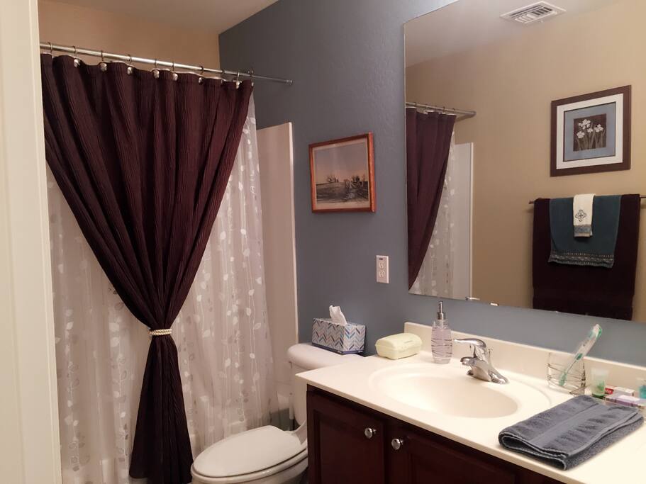Private full bathroom with double sinks