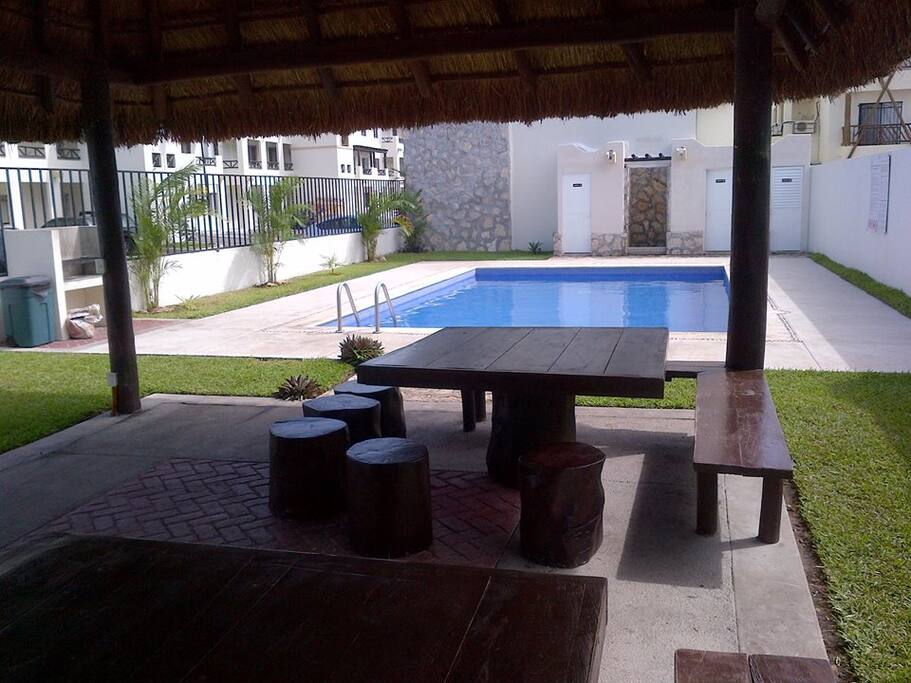 Alberca con palapa