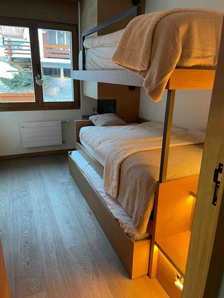 3rd bedroom with bunk beds and a pull-out mattress/bed underneath. Sleeps 3 in total.